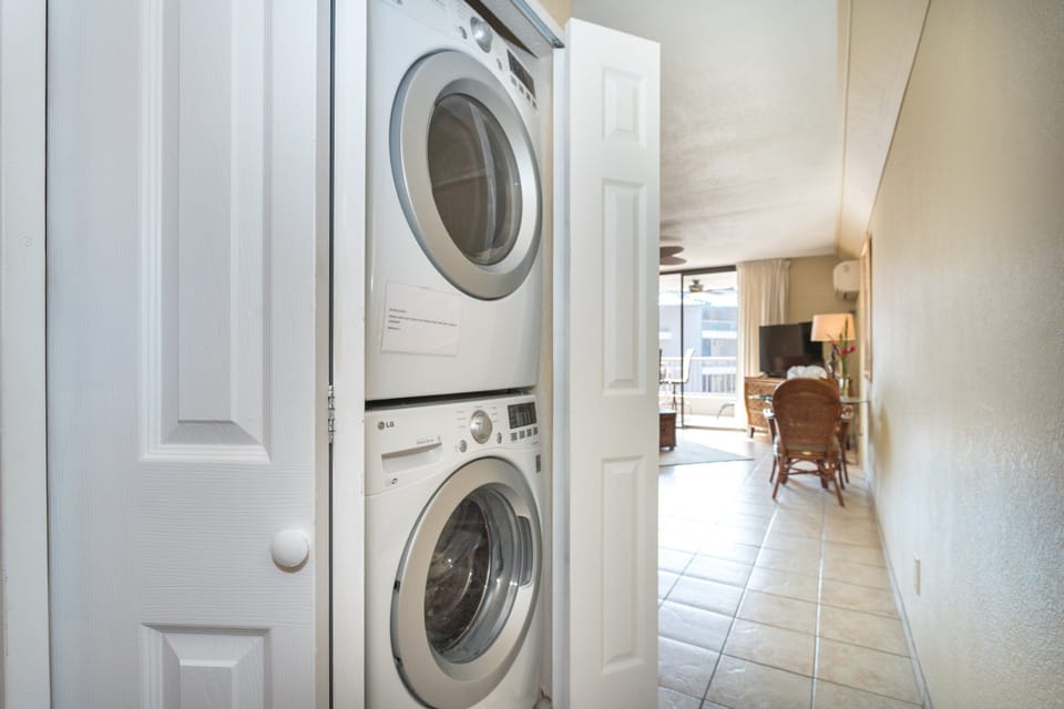 Washer and dryer off of the bathroom! Convenient laundry area inside the condo for long stays.
