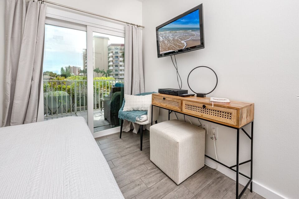 Bedroom offers a compact work station if needed