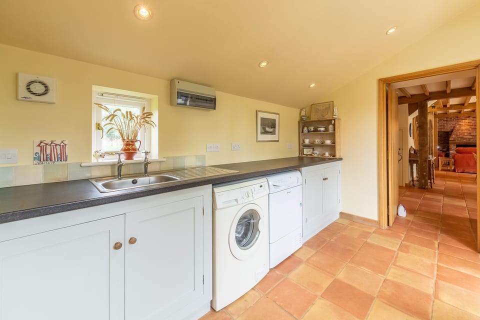 Ground floor: Utility room with washing machine and tumble dryer