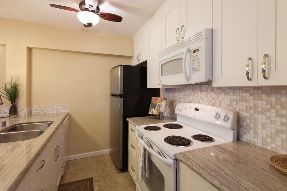 Full sized kitchen with all of the large and small appliances you are looking for.