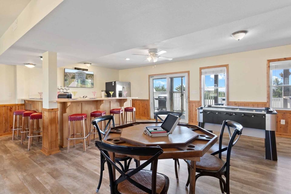 Challenge your family and friends to a game of pool, foosball or poker in the first level game room.