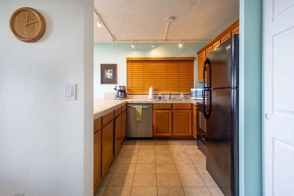 Well-appointed upgraded kitchen with full-size appliances, cookware, and everything needed to prepare meals at home.