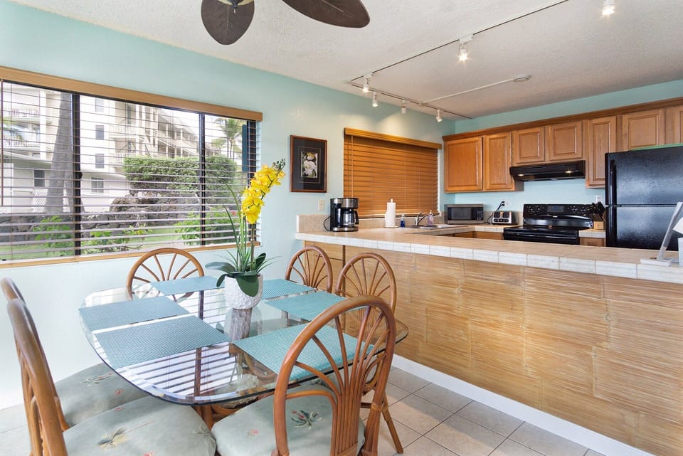 Indoor dining space positioned to enjoy the ocean view while sharing meals or planning your island adventures.