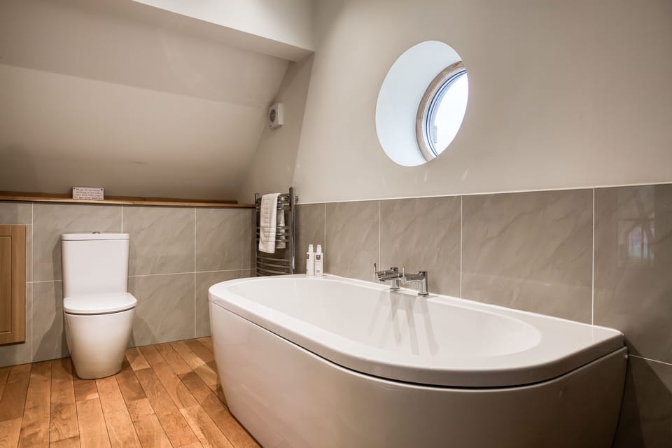 Second floor: Enjoy a relaxing bath in the tranquil en-suite bathroom