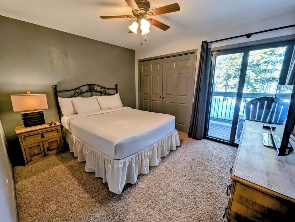 Guest bedroom with balcony access