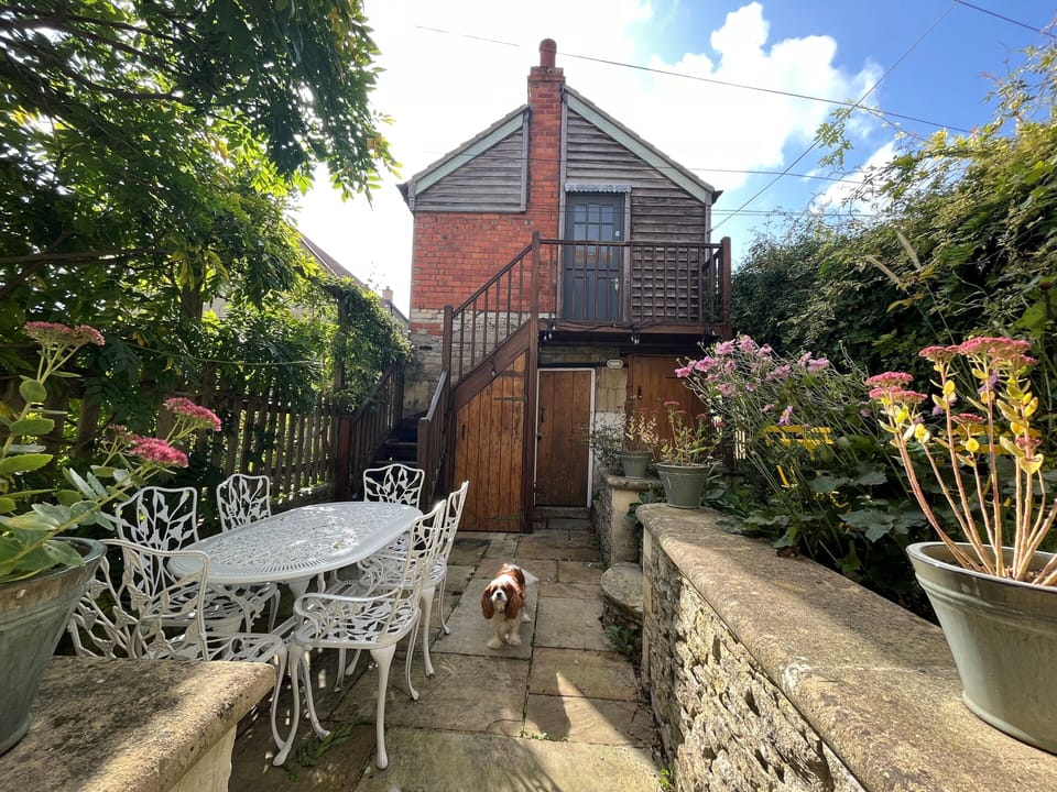 Garden with BBQ facilities, utility room, and a garden studio 