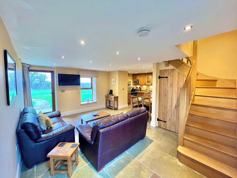 Lounge area with seating for 4 and views accross the countryside
