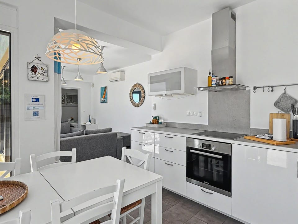 Modern kitchen and dining area—a welcoming space for easy home-cooked meals.