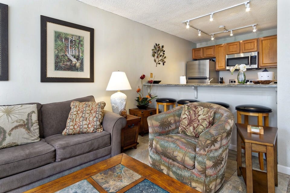 Relax in comfort with air conditioning, cable TV, and high-speed WiFi. Sofa converts into a queen bed for additional guests.