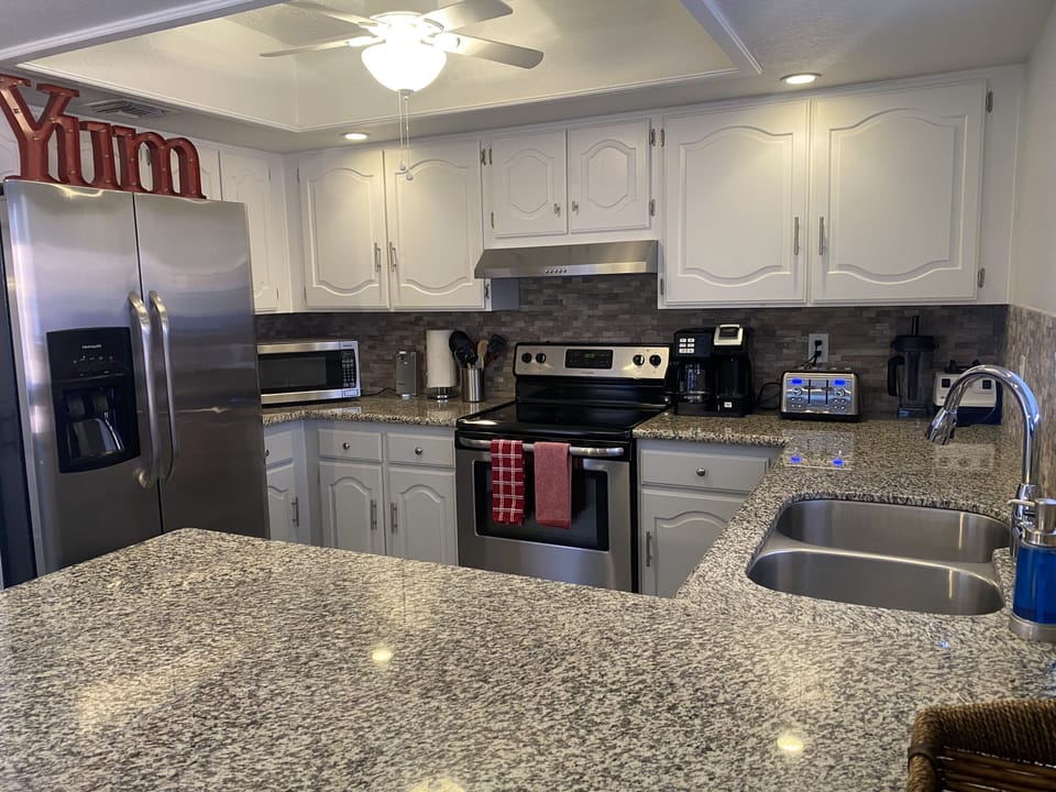 Double sink, D/W, blender, coffee maker & toaster all make your stay a dream!