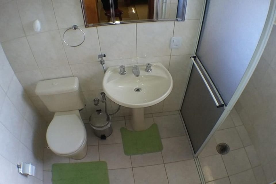 Shower, slippers, towels, soap