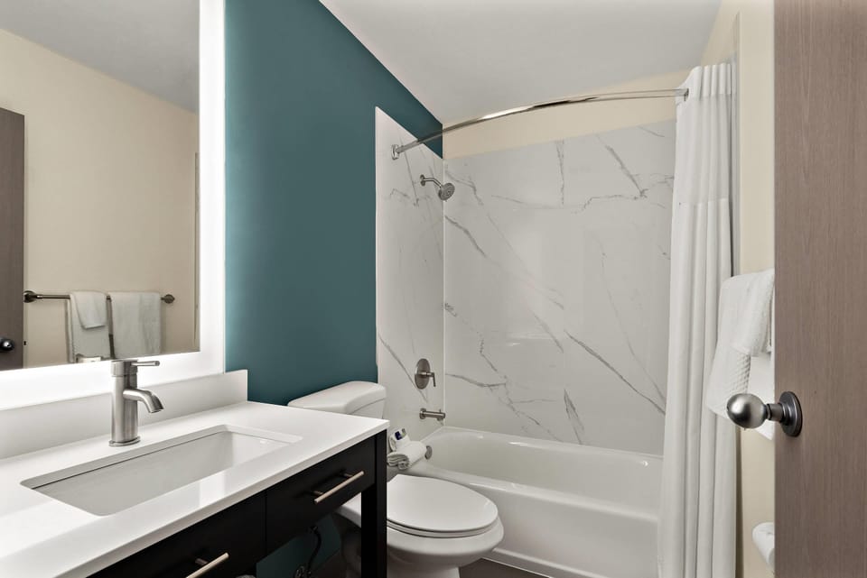 Premium bedding, pillowtop beds, desk, laptop workspace