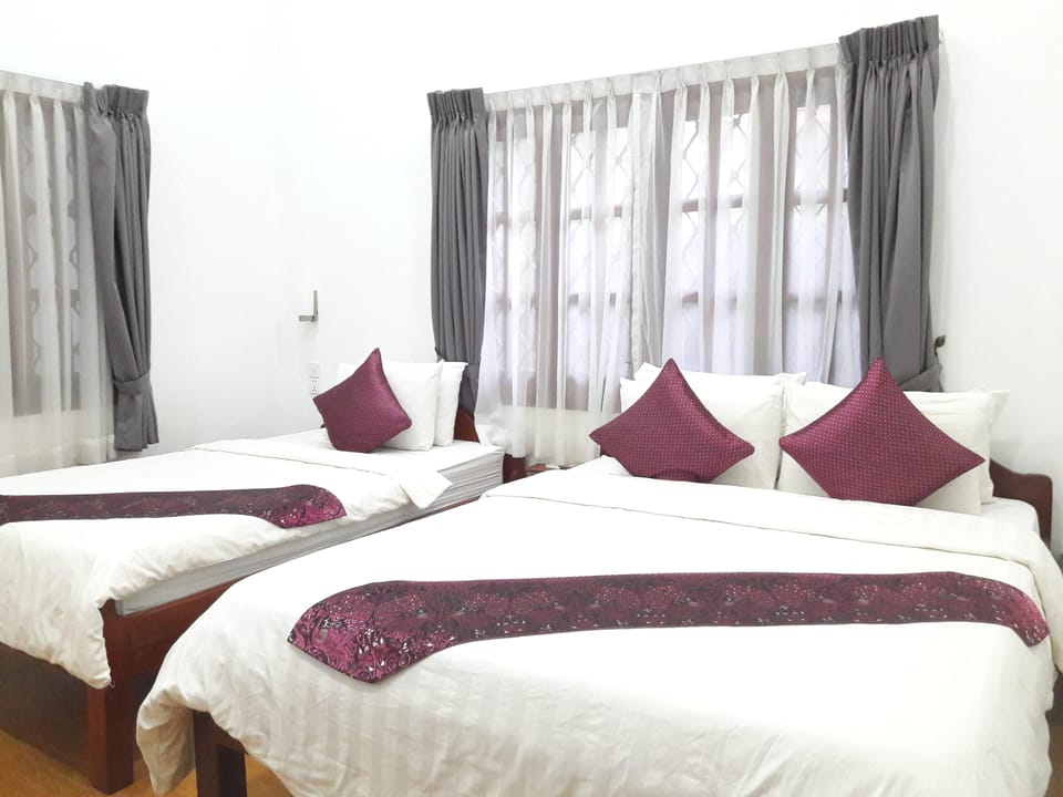 Standard Double or Twin Room | Minibar, in-room safe, desk, free WiFi