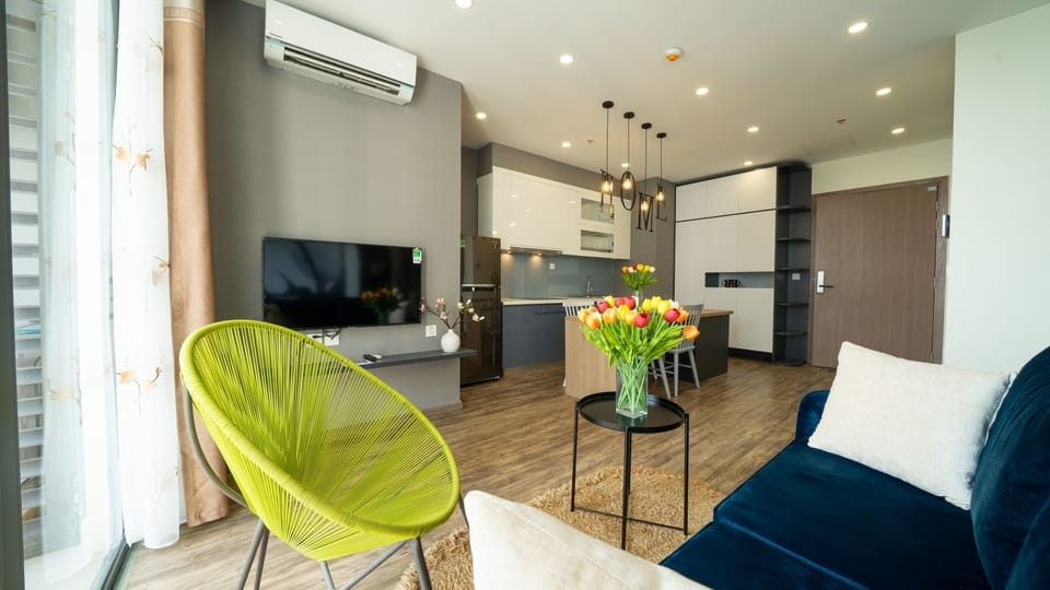Premium Suite, 2 Bedrooms, 2 Bathrooms | Living area | 68-inch Smart TV with cable channels, TV, pay movies