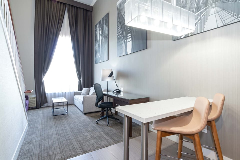 Suite, 1 King Bed with Sofa bed, Kitchen (Loft) | Premium bedding, pillowtop beds, in-room safe, desk