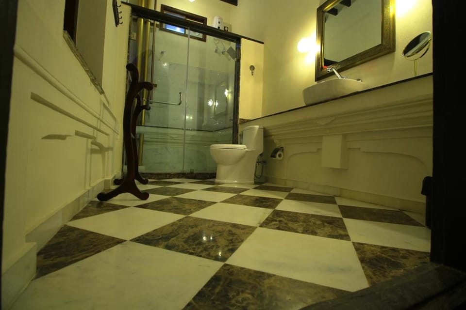 Shower, eco-friendly toiletries, hair dryer, slippers