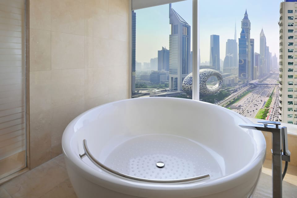 Suite, 1 Bedroom (Ambassador) | Bathroom | Separate tub and shower, deep soaking tub, rainfall showerhead