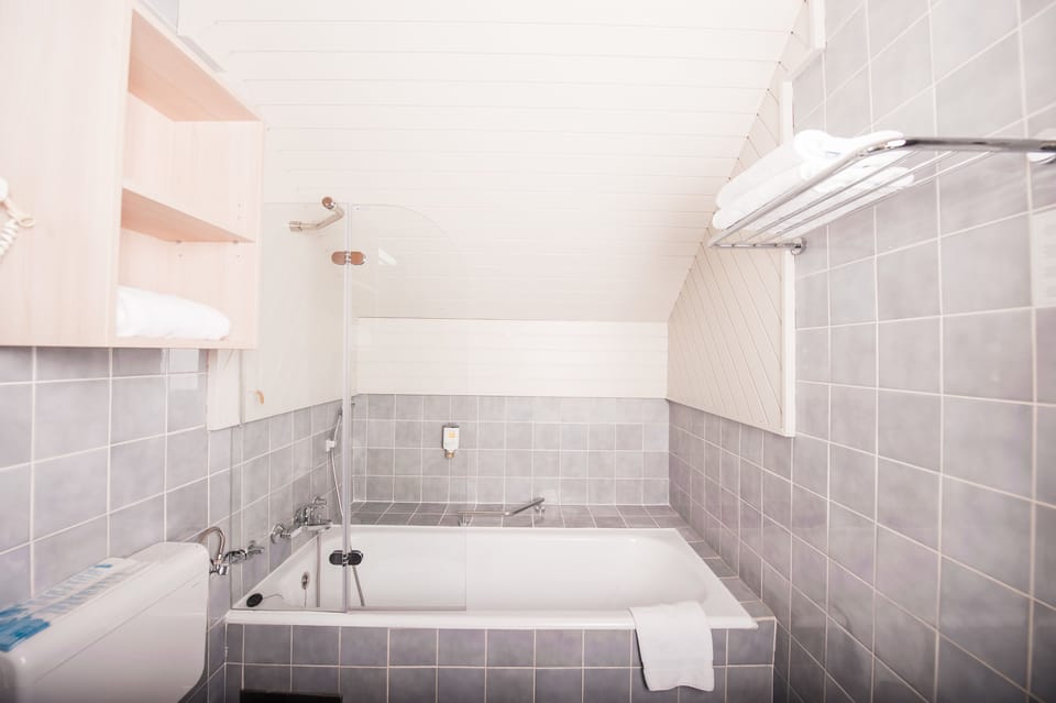 Hair dryer, bathrobes, slippers, towels