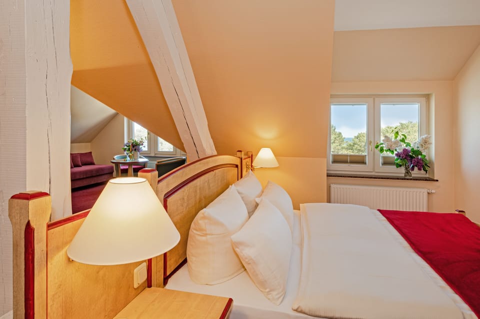 Junior Suite, Sea View | Hypo-allergenic bedding, in-room safe, individually decorated, free WiFi