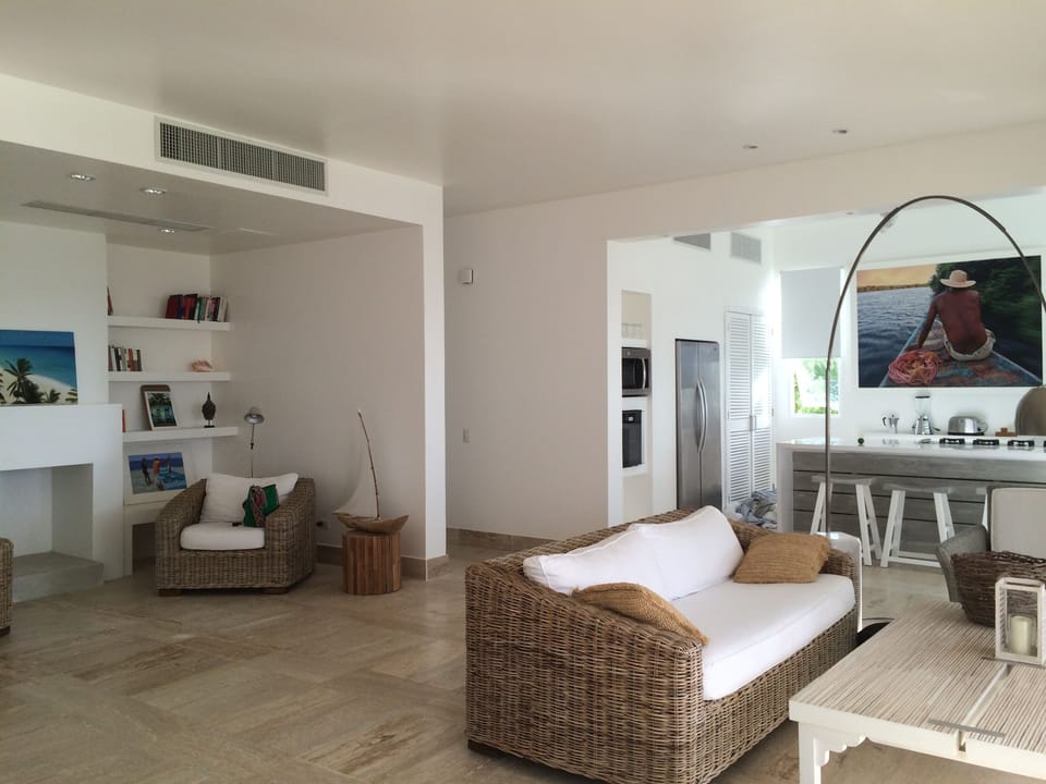 open living area with access to the kitchen