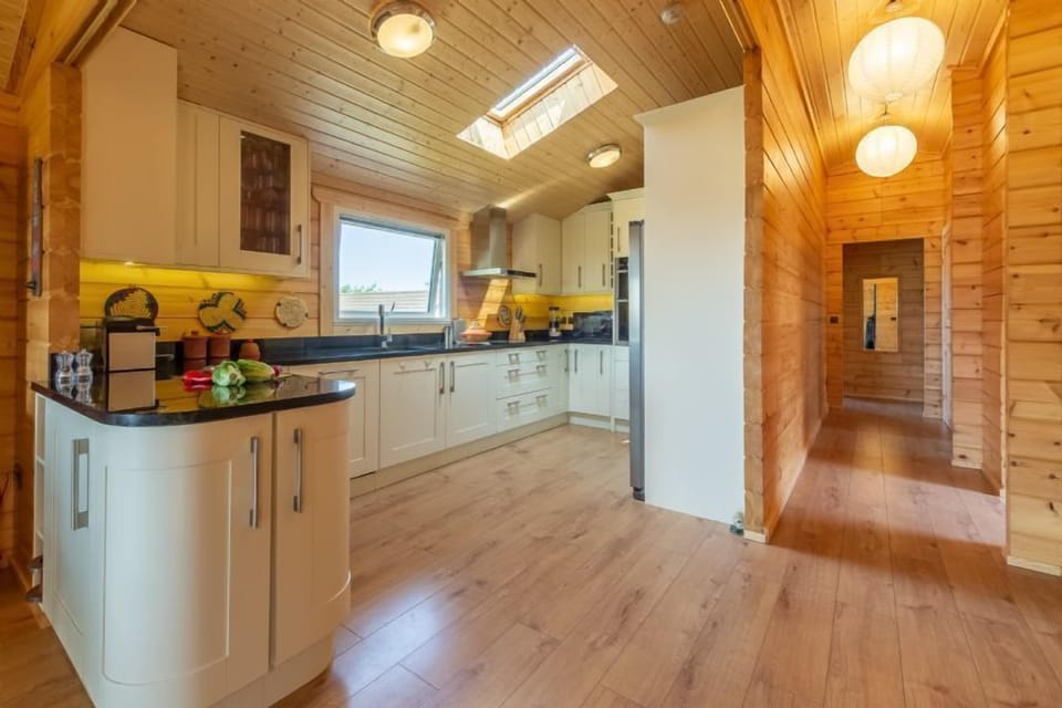 Ground floor: The kitchen is fully equipped with an electric oven and hob, combi microwave/oven/grill, fridge/freezer and dishwasher