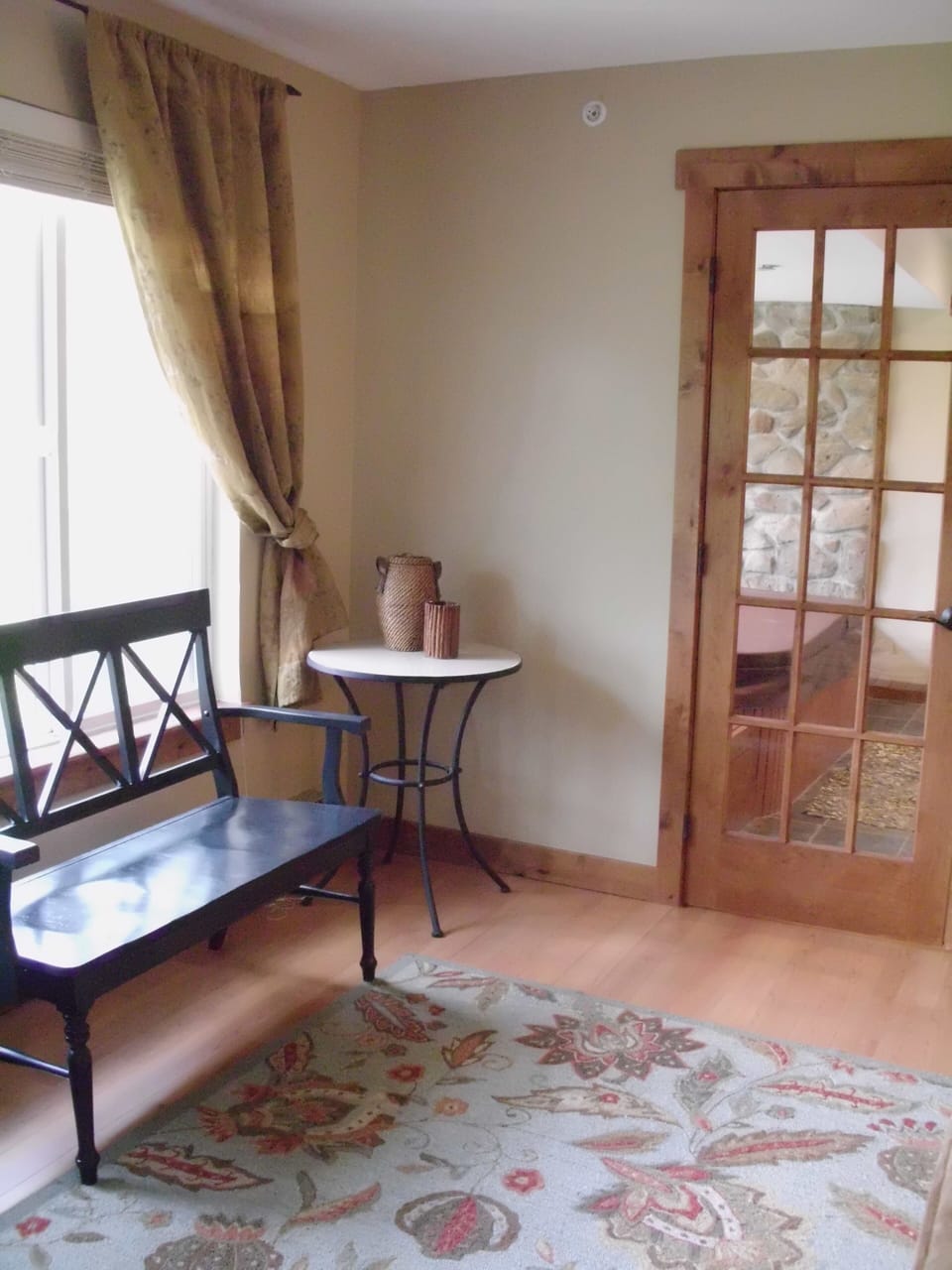 Window seating and French doors to hot tub room