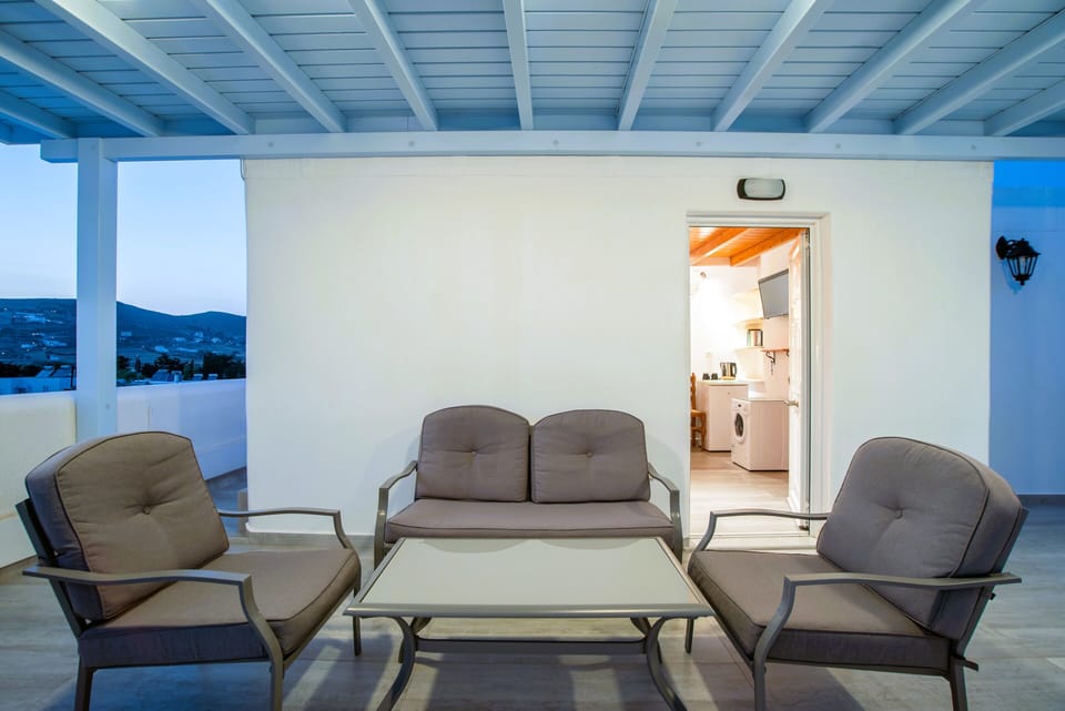 Your private terrace with outdoor seating with pergola on the third floor.