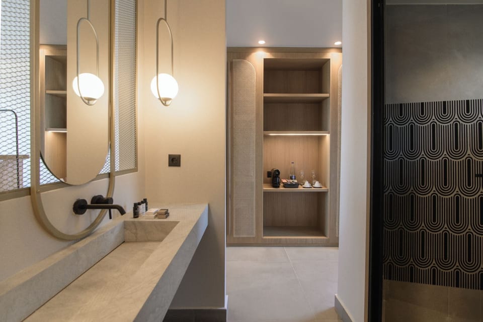 Premium Studio Suite, 1 King Bed, Private Pool, Sea View | Bathroom | Designer toiletries, hair dryer, slippers, towels