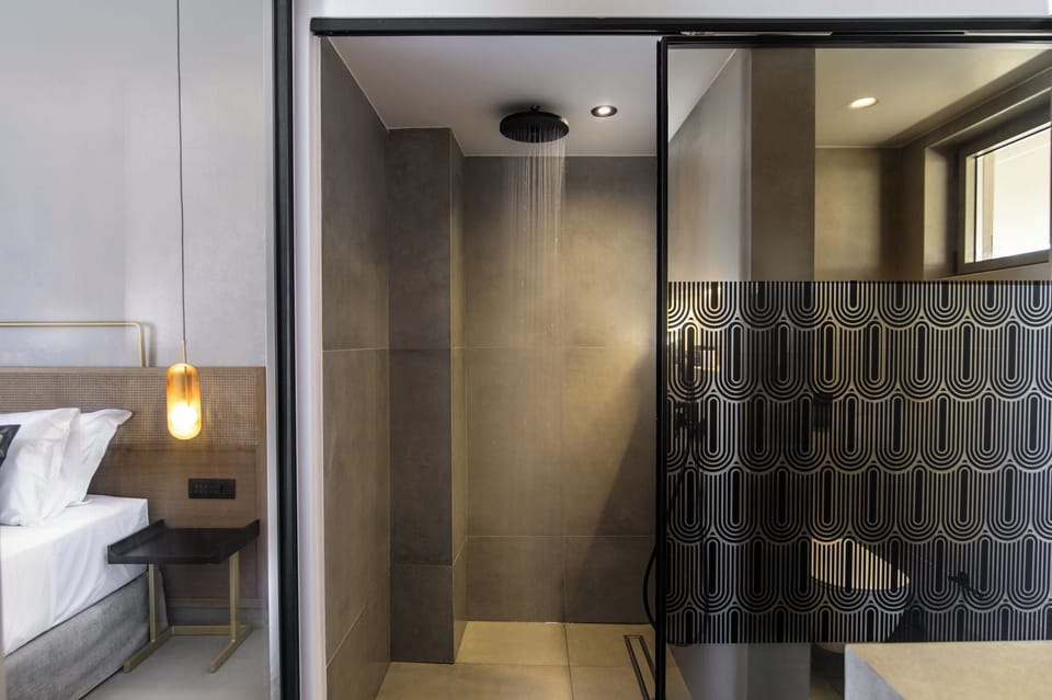 Premium Room, 1 King Bed, Balcony, Sea View | Bathroom | Designer toiletries, hair dryer, slippers, towels