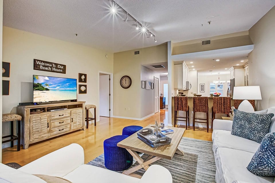Open and spacious living room with updated and comfortable furnishings.