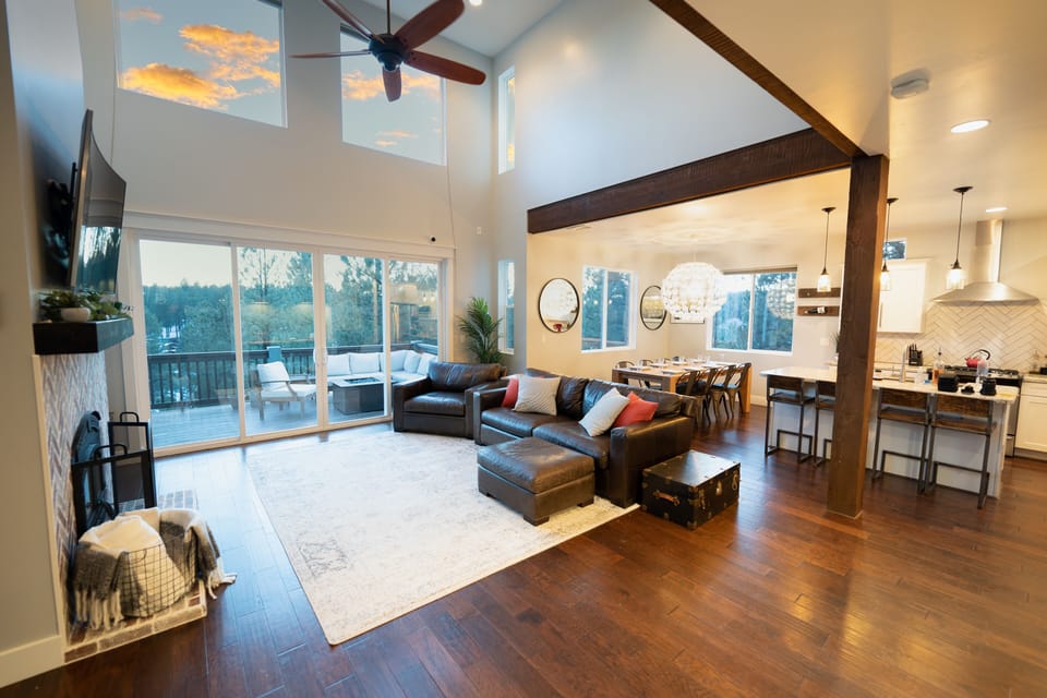 Living Room with 20' Ceilings.  Endless Ponderosa Pine Views with Woody Mountain