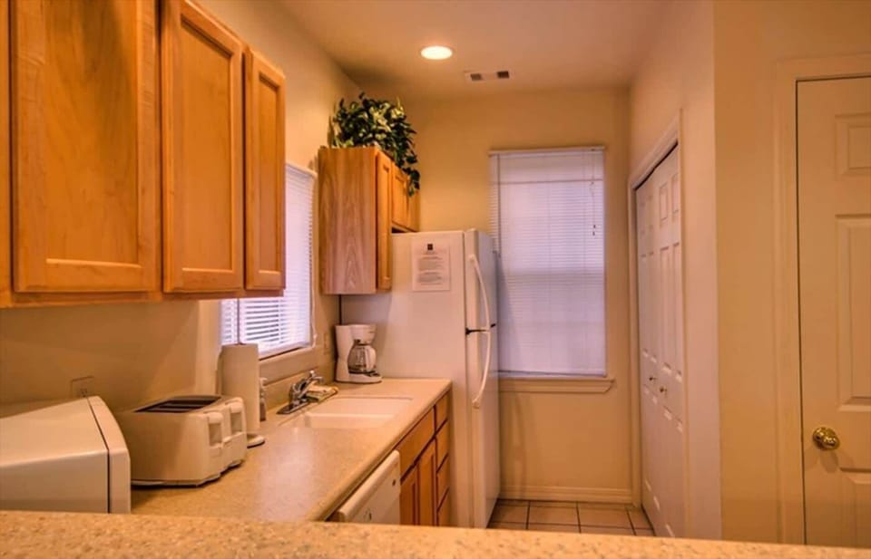 The Kitchen is opened to Dinning and Living Room.
