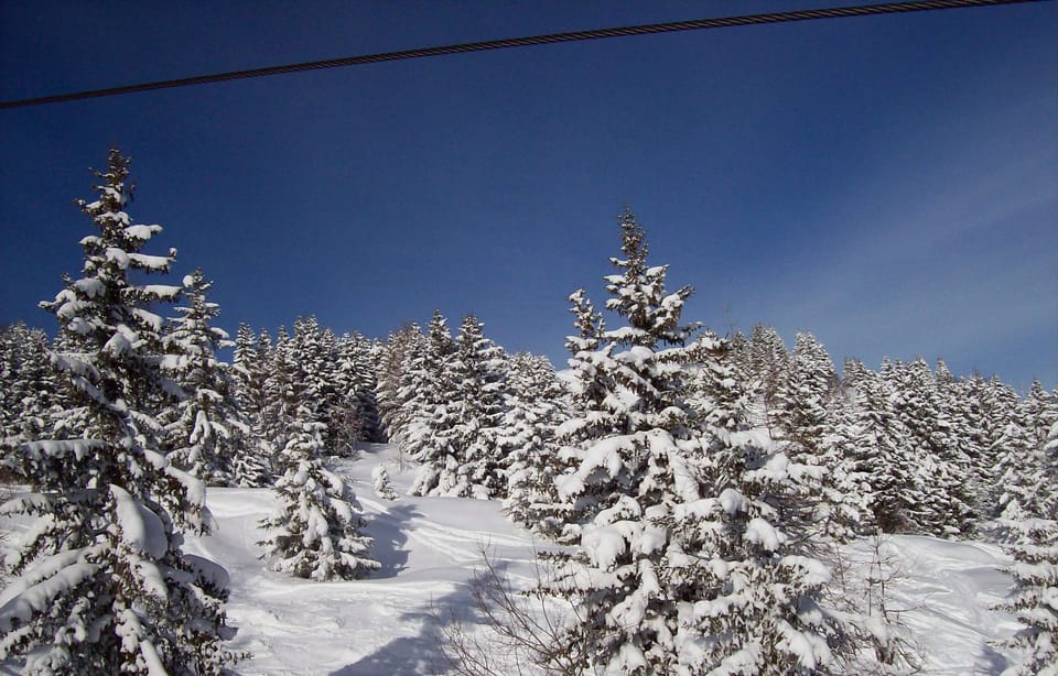 Prarion  off-piste and groomed piste is nearby , seen from chairlift.