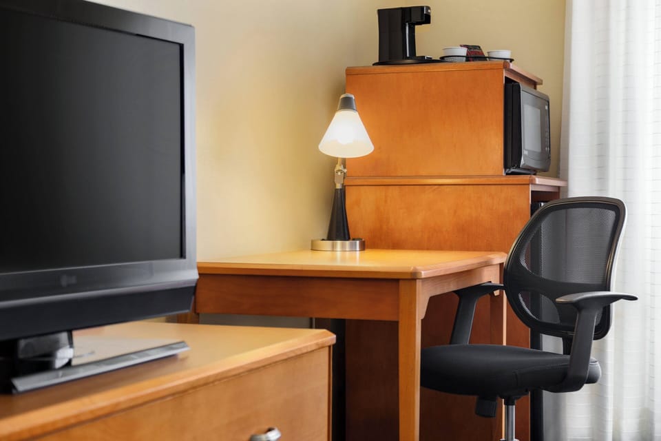 Premium bedding, pillowtop beds, desk, laptop workspace