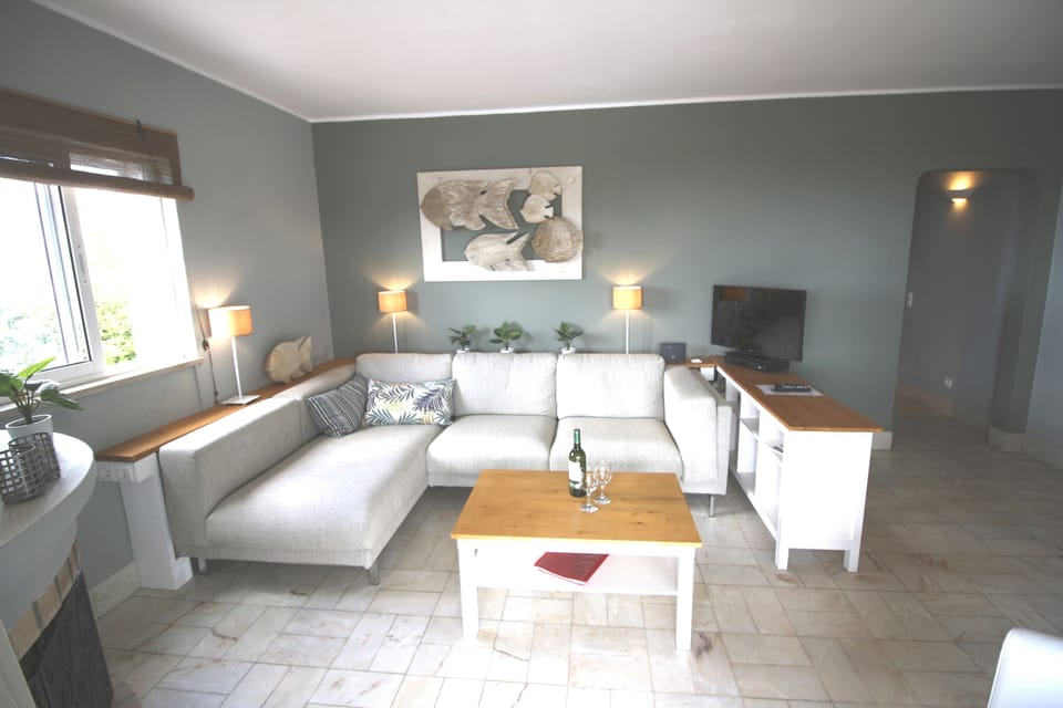 Bedroom 1 has queen size double bed, wardrobe, safe and doors to pool patio