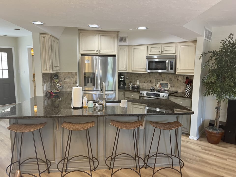 Kitchen bar area open to living room. 