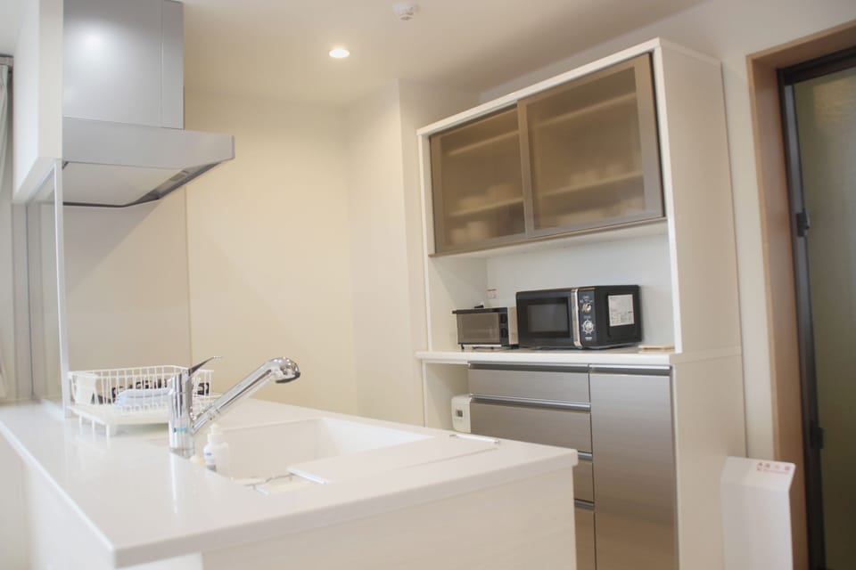 Comfort Condo | Private kitchen | Full-size fridge, microwave, stovetop, toaster