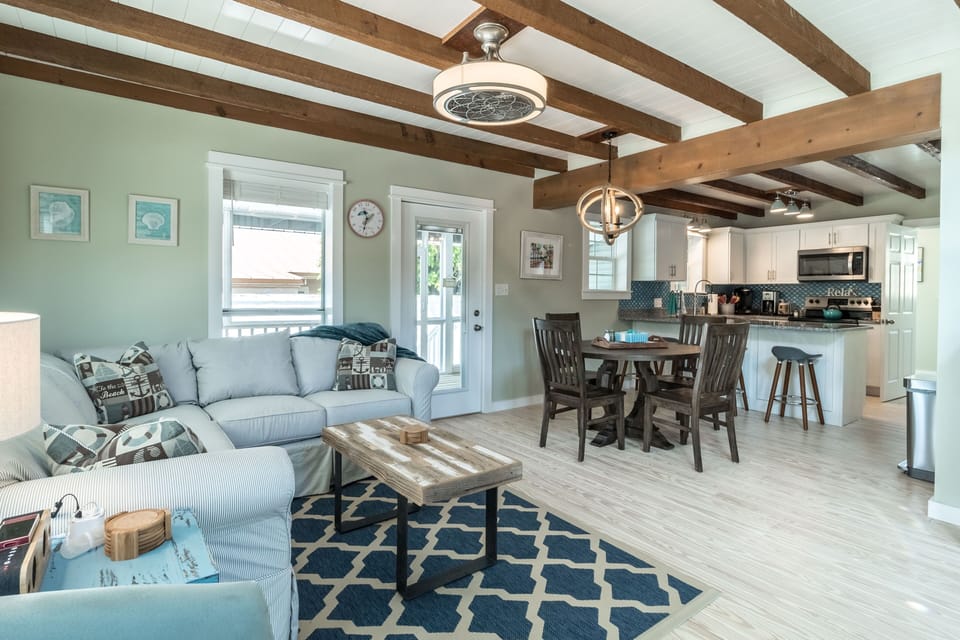 Living room, dining area, and kitchen all flow together