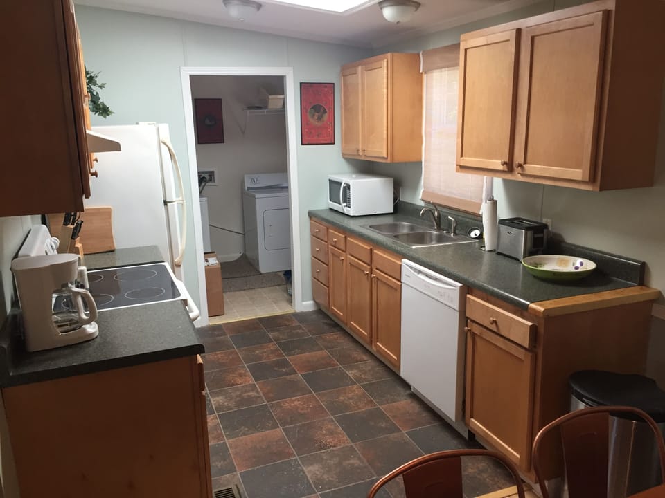Fully Equipped Kitchen; Laundry Room.