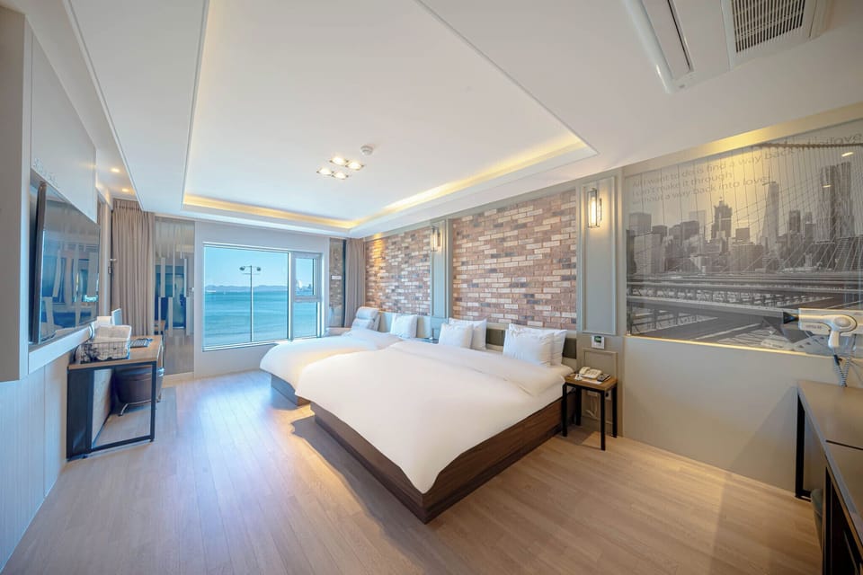 Deluxe Twin Room, Multiple Beds, Non Smoking, Ocean View | Premium bedding, down comforters, laptop workspace, blackout drapes