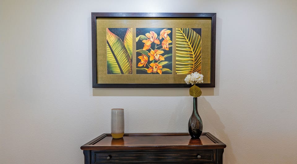 Located at the top of the stairs.