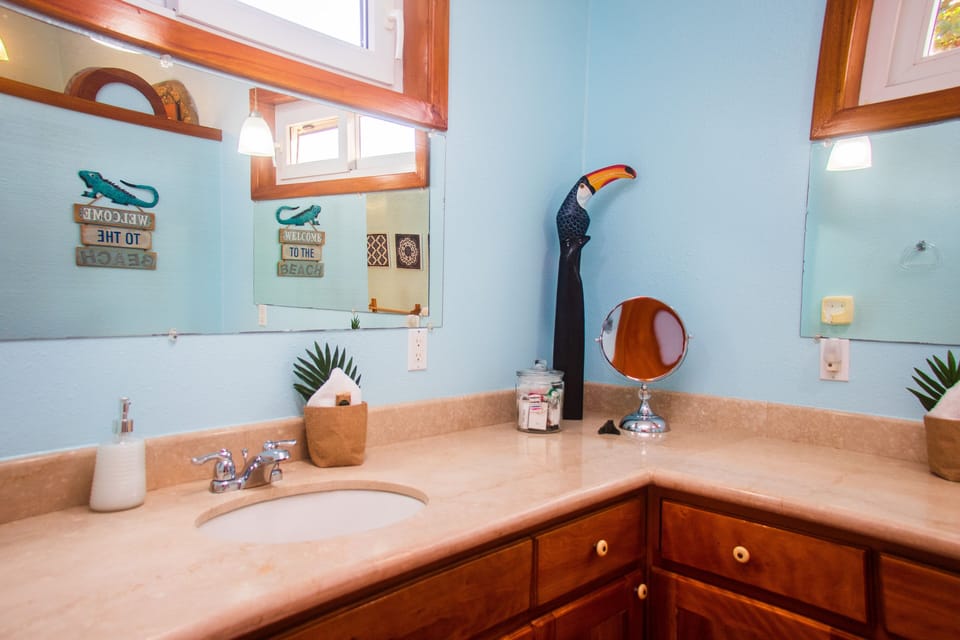 Penthouse Master Bath 1 with two sinks.