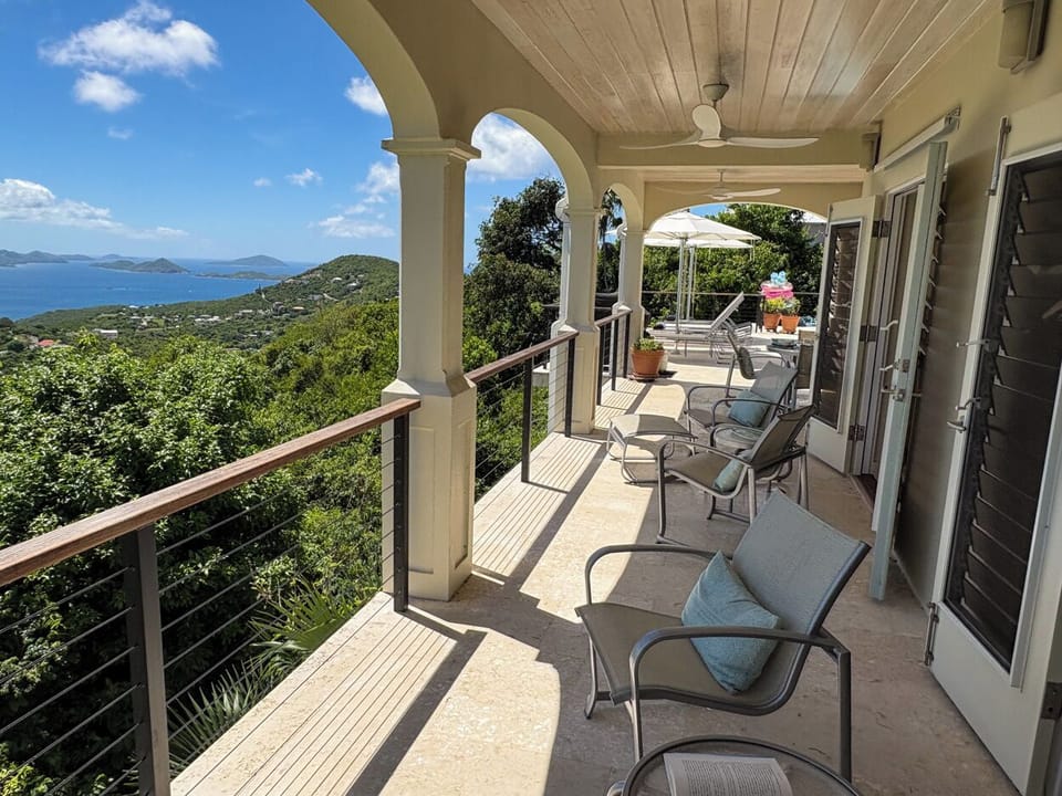 If you are looking for a cozy spot in the shade, relax under the covered balcony located just off the great room