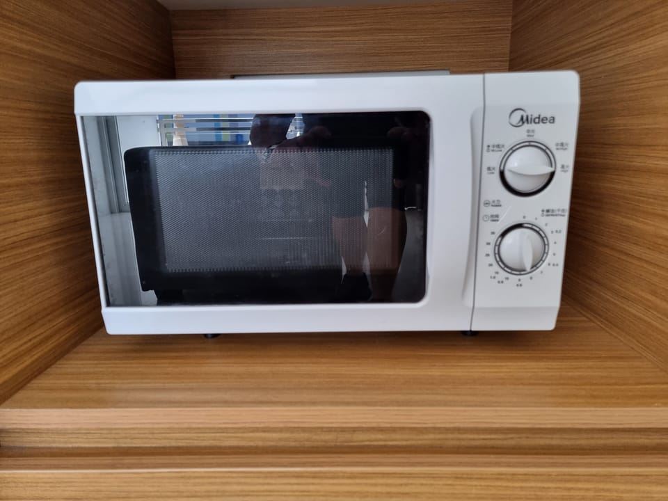 Full-size fridge, microwave, rice cooker, cookware/dishes/utensils