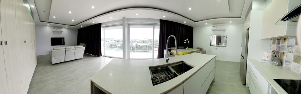 City Penthouse | Private kitchen | Full-size fridge, microwave, rice cooker, cookware/dishes/utensils