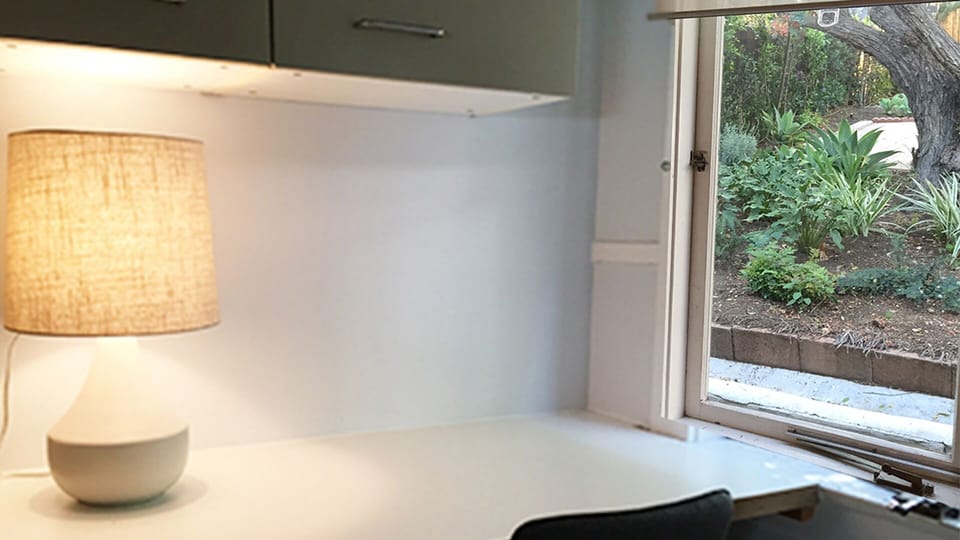 Desk/work area inside kitchen.