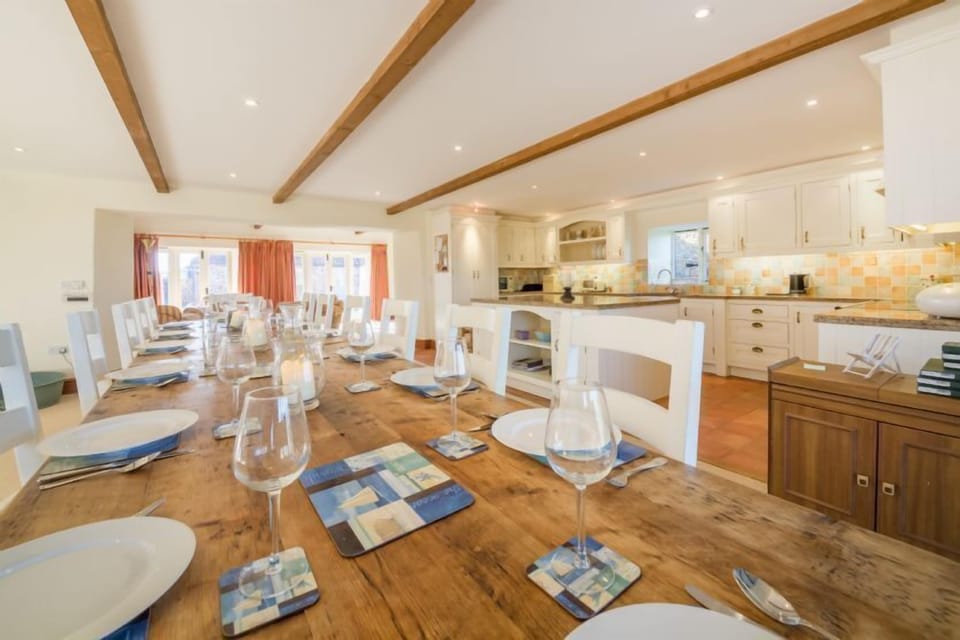 Ground floor: Large dining table with seating for twelve