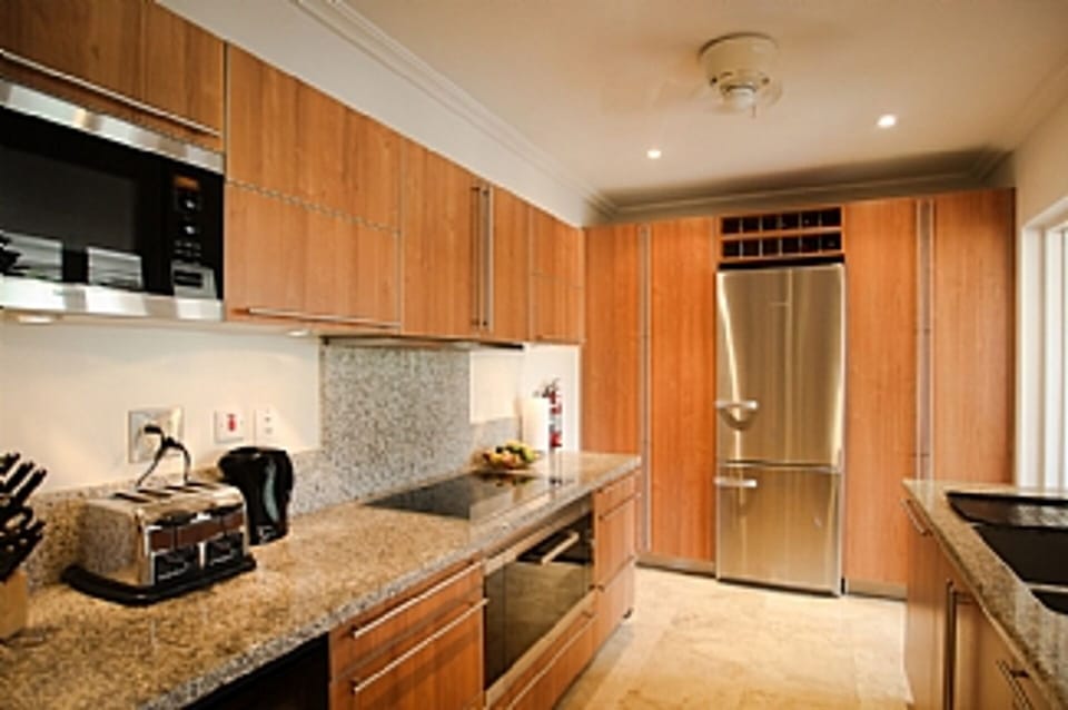 Miele Kitchen with wine cooler, microwave, fridge/freezer, hob and oven