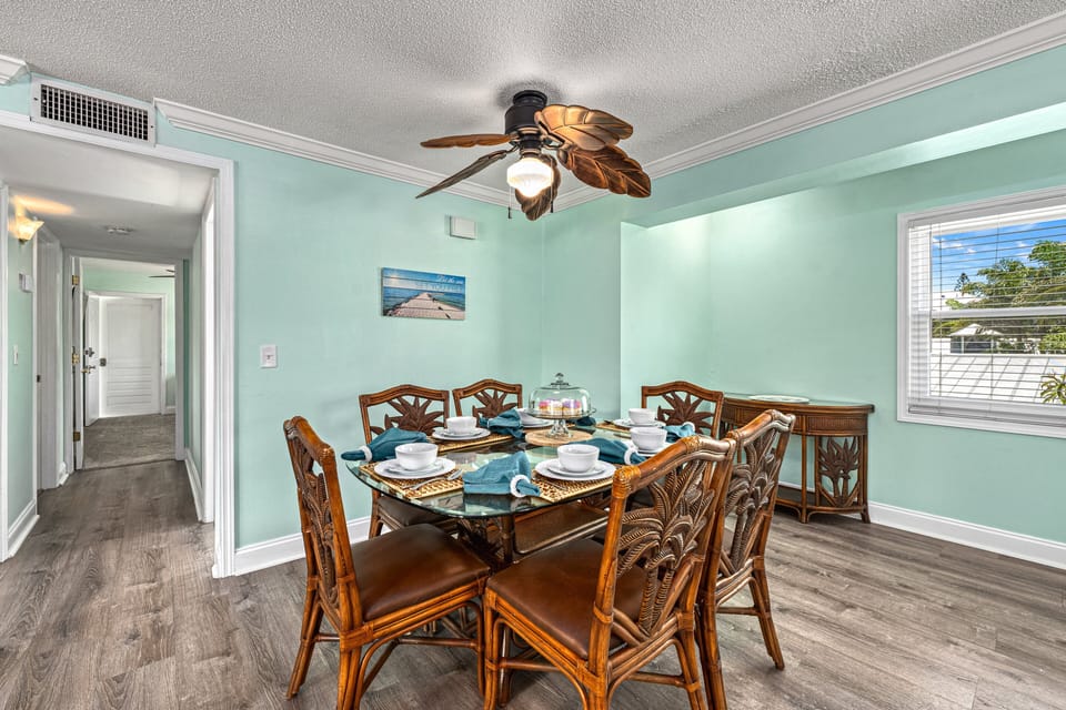 An elegant and simple dining space where meals, laughter, and beach-day stories come together.