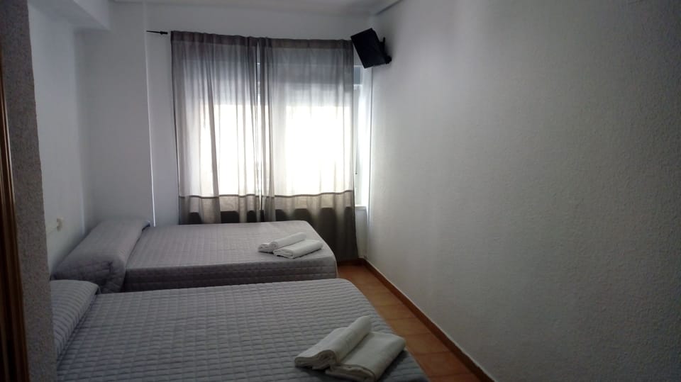 Blackout drapes, free WiFi, bed sheets